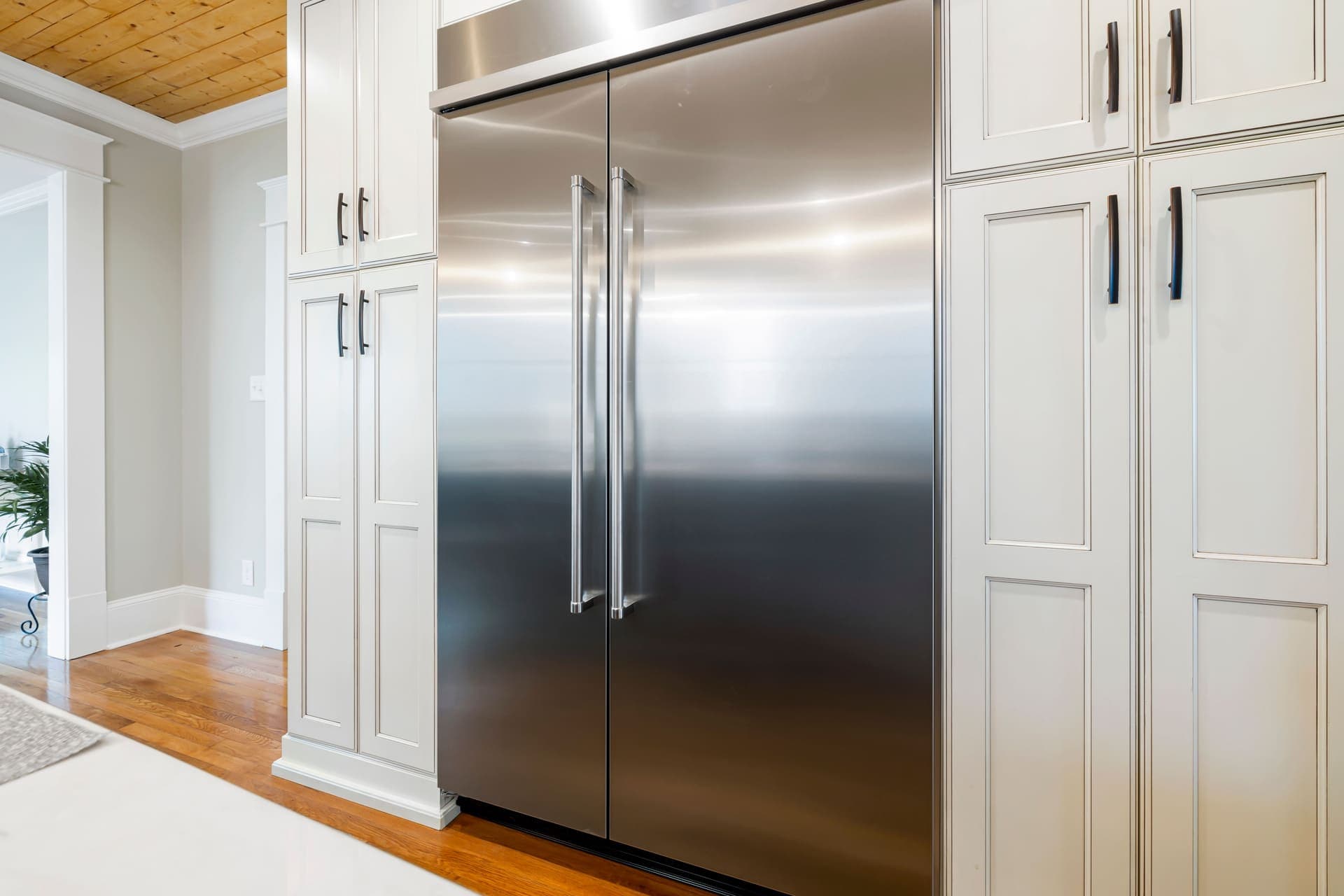 A stainless steel refrigerator in a kitchen
