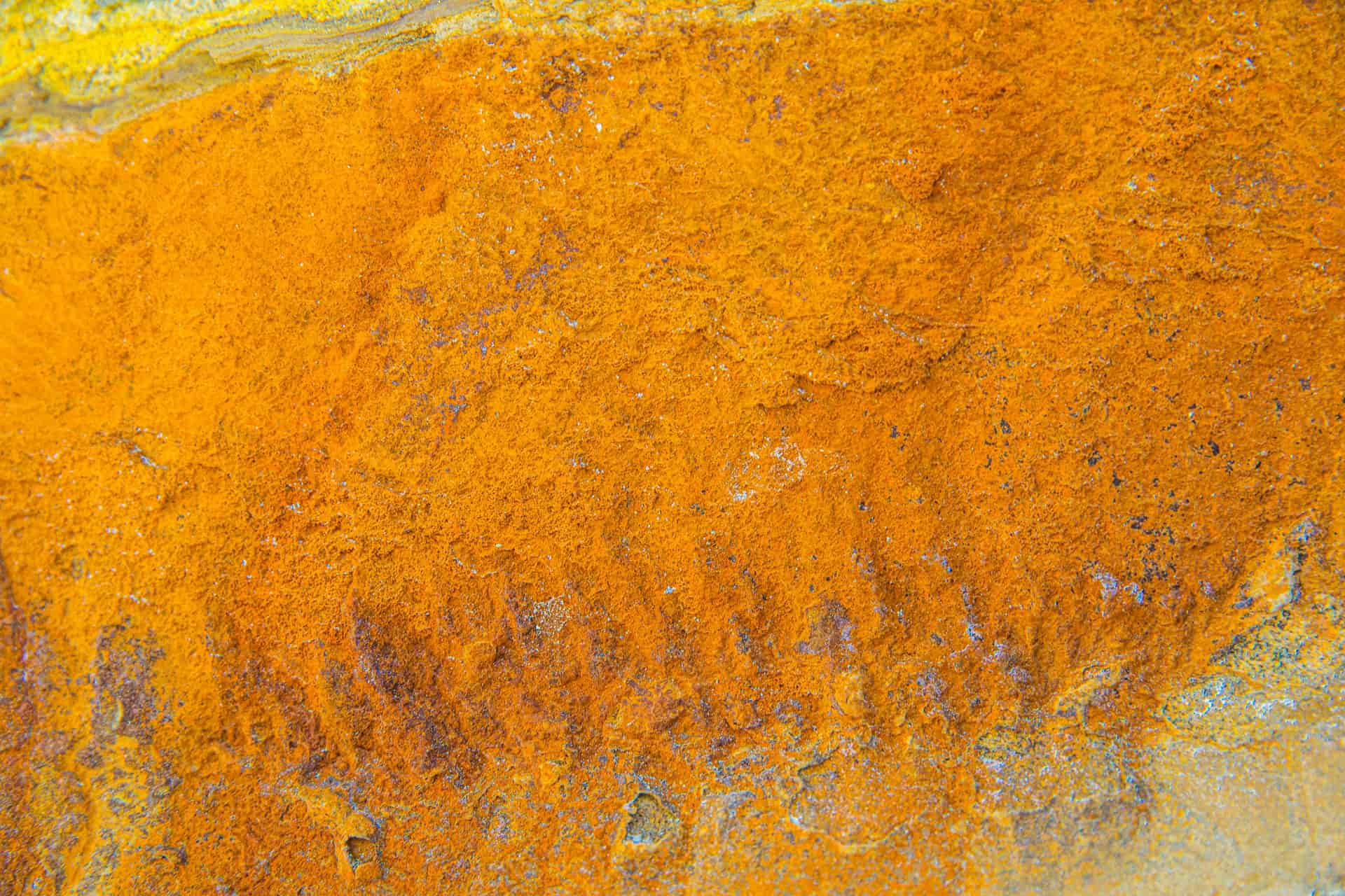 Orange iron staining in a sink basin