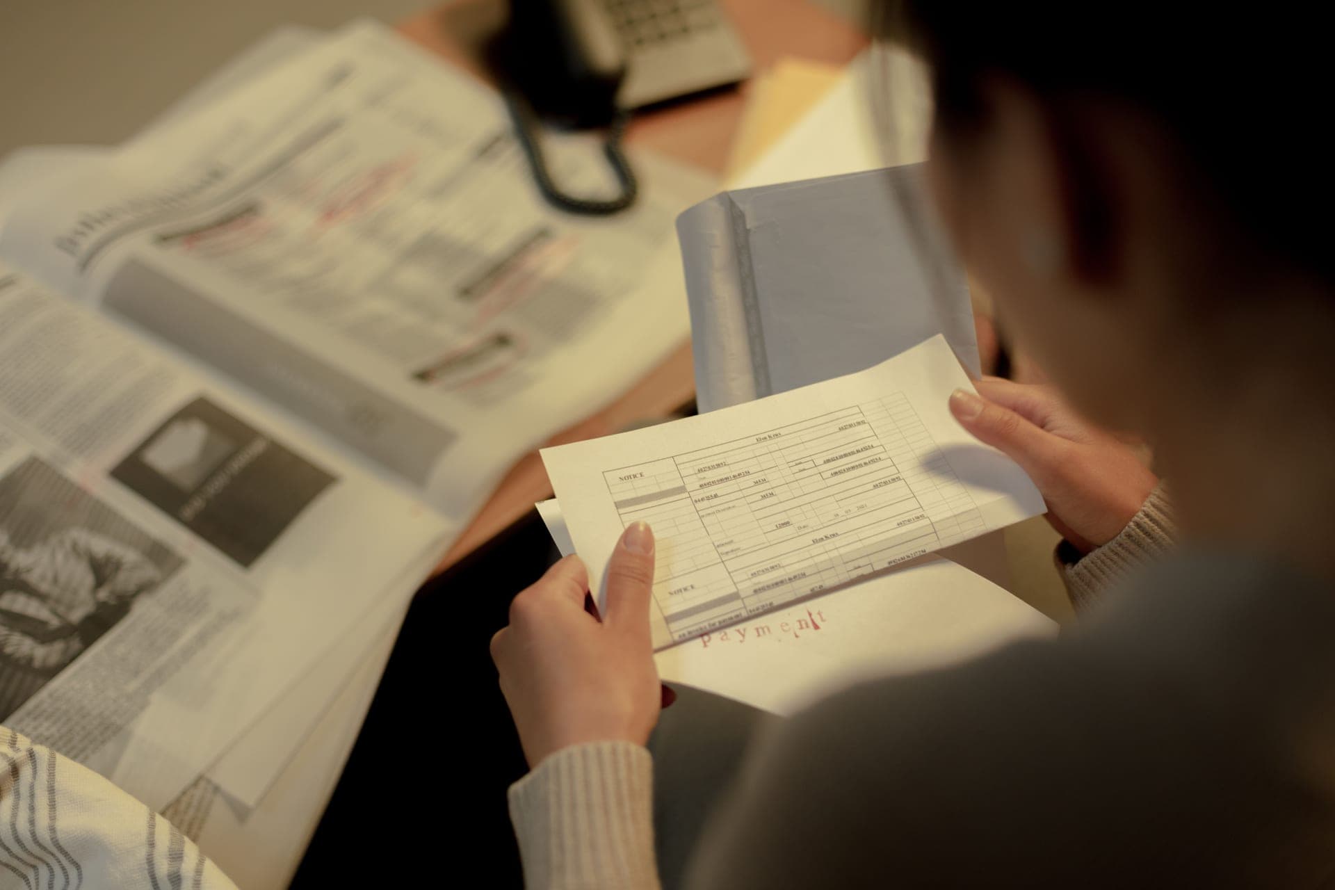 Specification documents open on a desk