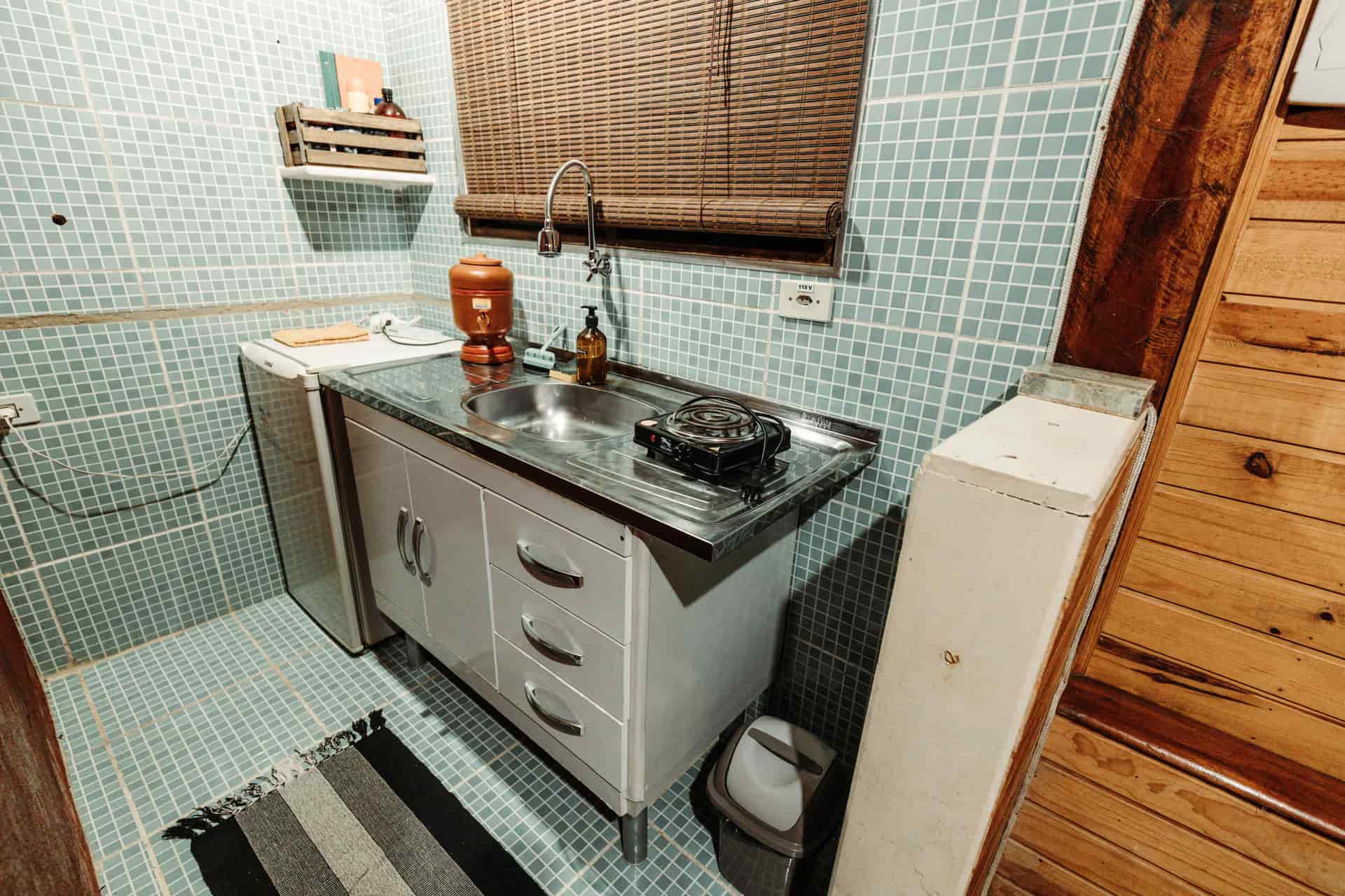 A compact apartment kitchen sink area